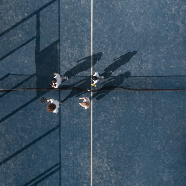 view-people-playing-paddle-tennis